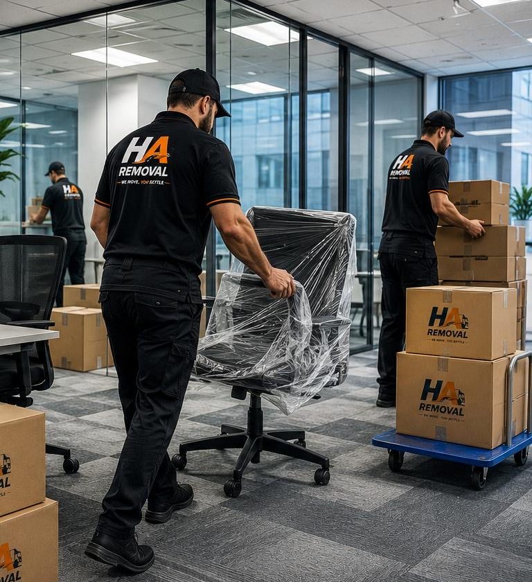 HA Removal team moving office furniture and equipment
